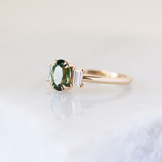 Oval Cut Green Sapphire Ring quarter side view with reflection