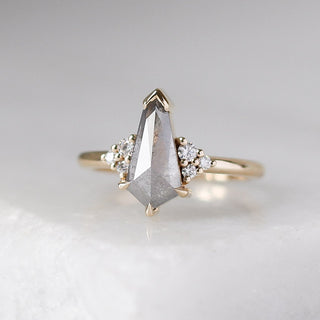 Shield cut diamond ring in yellow gold front view