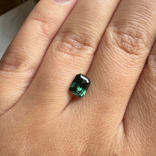 1.72ct Radiant Cut Green Sapphire on hand close up