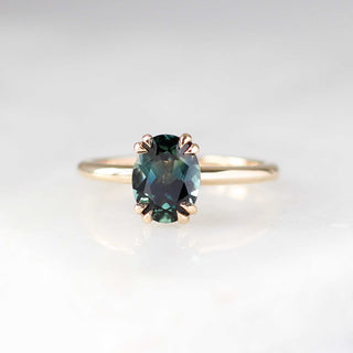 Teal oval sapphire solitaire ring front view