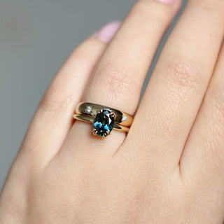 Teal oval sapphire solitaire ring wedding set on hand