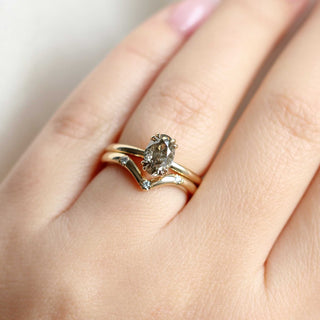 Three diamond chevron band wedding set on hand