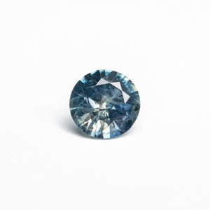 0.68ct 5.56x5.48x3.30mm Round Brilliant Sapphire 19940-09 - Yuliya Chorna Jewellery