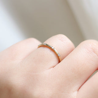 five diamond wedding band worn side view