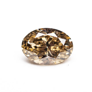 Oval champagne diamond on a white background