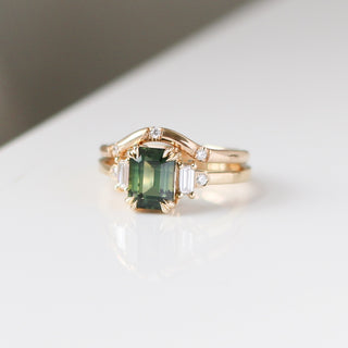 Misceo Emerald Cut Green Sapphire Ring stacked with 3 point diamond gold band front view