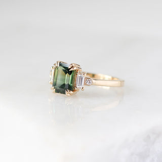 Misceo Emerald Cut Green Sapphire Ring detailed quarter front view