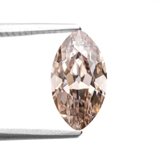 Champagne moval old mine cut lab created diamond in tongs