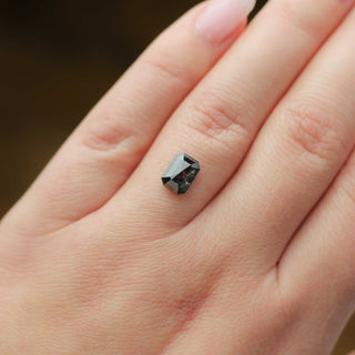 Rectangular salt and pepper diamond on hand