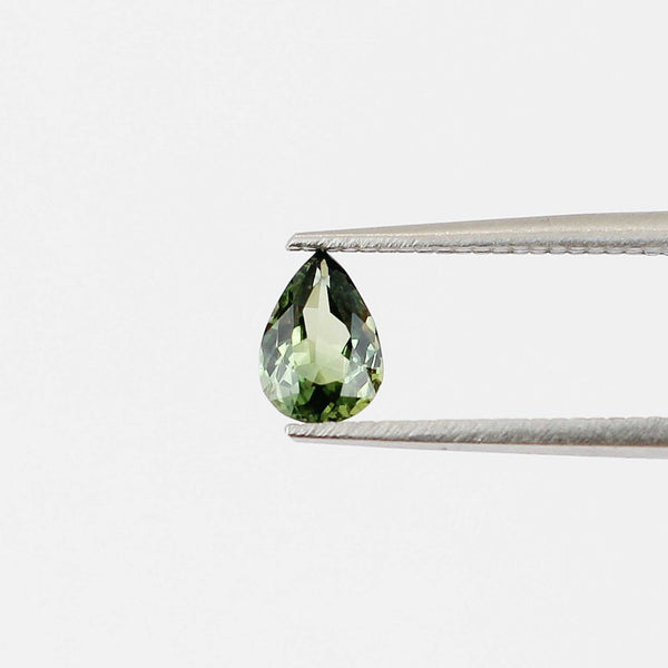 Pear shaped green sapphire front view