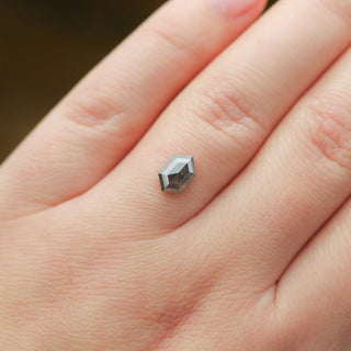 Hexagon shaped salt and pepper diamond on hand