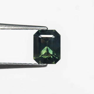 0.69ct 5.89x4.67x2.82mm Cut Corner Rectangle Step Cut Sapphire 27336-28