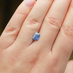 Rectangular blue sapphire on hand