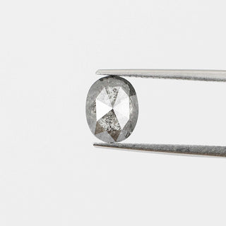 Oval shaped salt and pepper diamond