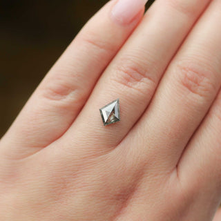 Kite shaped salt and pepper diamond on hand