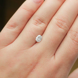Oval shaped icy salt and pepper diamond on hand