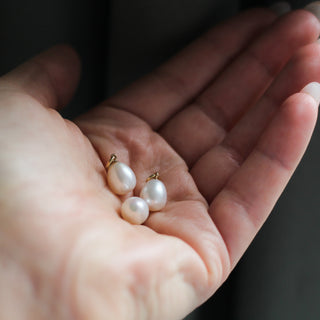 Pearl Drop Charms in a palm 