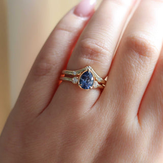 Three diamond chevron band wedding set on hand