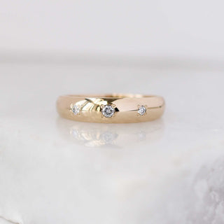 Domed three diamond band front view