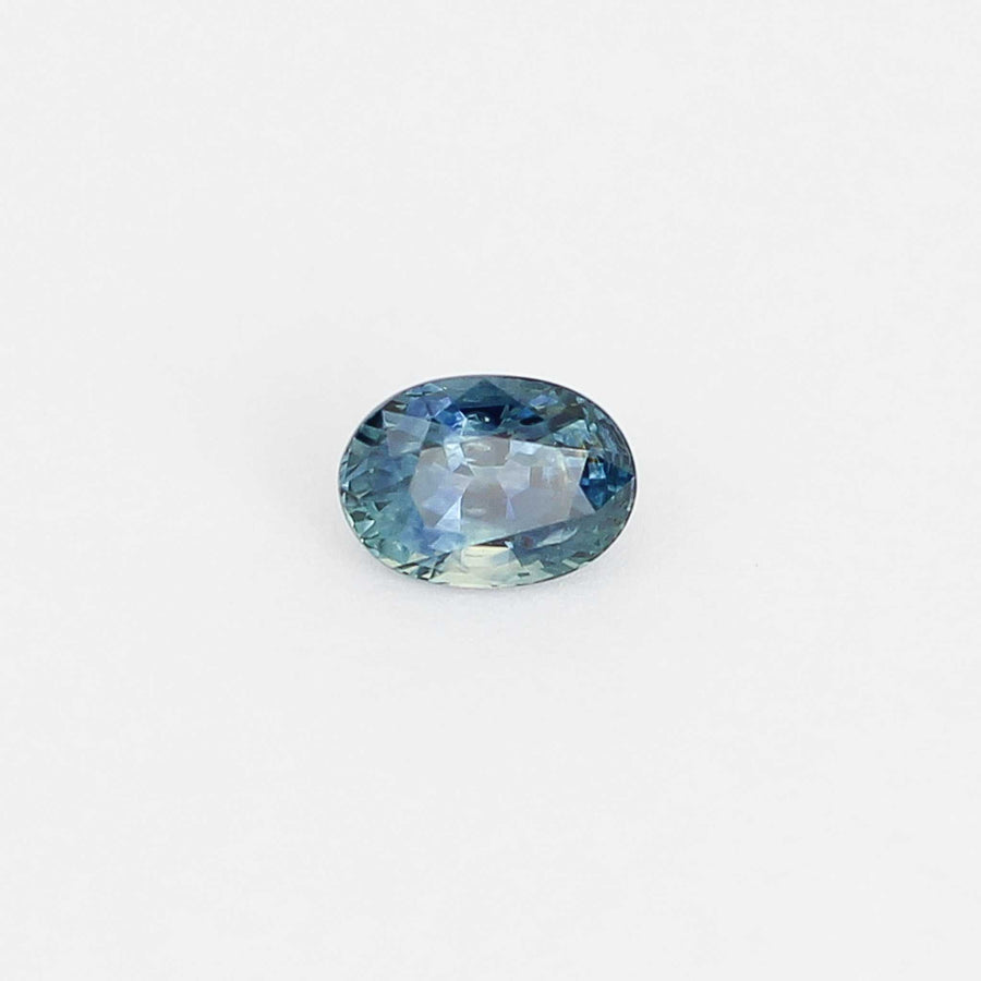 Oval shaped teal sapphire front view