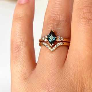 Teal Kite Sapphire Ring with diamond wave band on hand