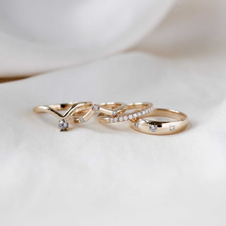 Domed diamond band in wedding band stack