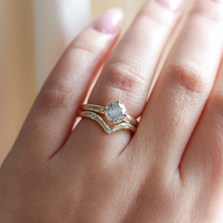 Three diamond chevron band wedding set on hand