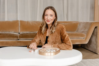 Yuliya Chorna, founder and designer, wearing custom fine jewellery handcrafted at her Toronto studio.