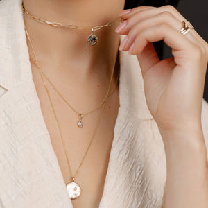 Round Rustic Diamond Pendant on chain worn on neck 