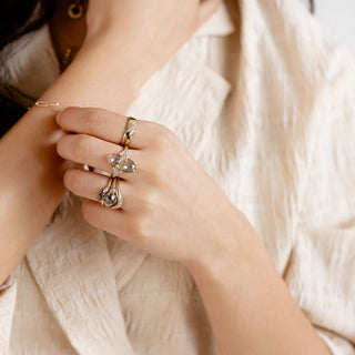 Round rose cut salt and pepper diamond right styled on hand 