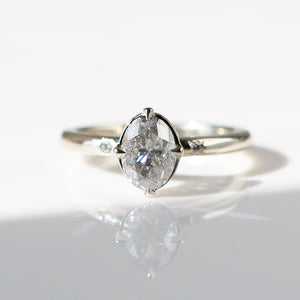 Oval grey diamond ring in direct sun