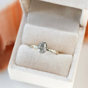 Oval grey diamond engagement ring in ring box