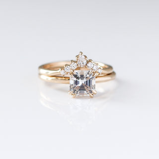 Asscher Cut Sapphire Ring paired with crown diamond gold band front view 