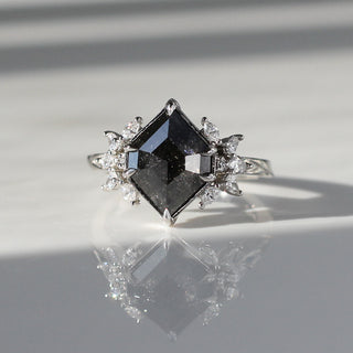 Custom engagement ring with ethically sourced black hexagon diamond centre stone in a platinum setting, handcrafted by Yuliya Chorna at her Toronto studio.