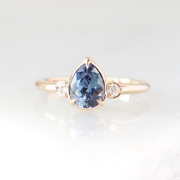 Pear blue sapphire engagement ring