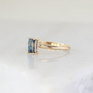 Teal blue sapphire ring side view