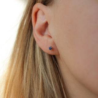 Round Blue Sapphire Stud Earrings worn