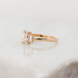 Emerald cut champagne diamond engagement ring side view