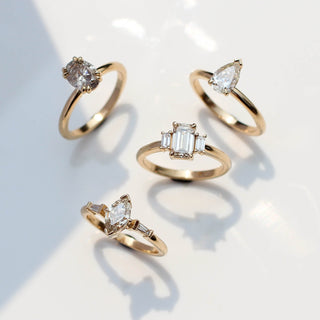 Emerald cut champagne diamond ring in natural light group shot