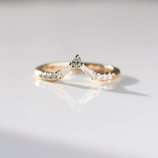 Custom point wedding band with ethically sourced diamonds in a gold setting, handcrafted by Yuliya Chorna at her Toronto studio.
