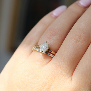 Claire White Lab Diamond Band stacked with white diamond gold ring on hand in sunlight