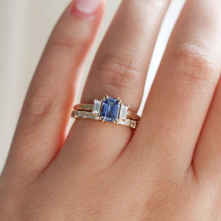 Claire White Lab Diamond Band paired with blue sapphire ring being worn