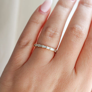 Claire White Lab Diamond Band being worn on hand front view