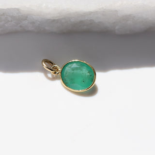 Large Emerald Bezel Charm in sunlight detailed side view