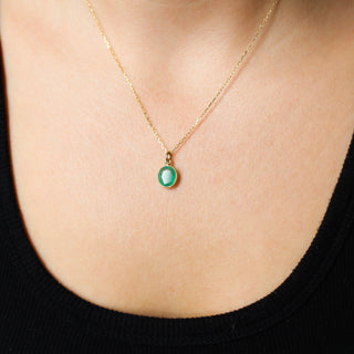 Large Emerald Bezel Charm being worn as a necklace 