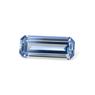 Emerald cut blue sapphire side