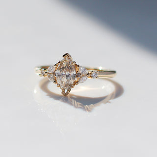 Folia Marquise Cut Champagne Diamond Ring quarter view in sunlight