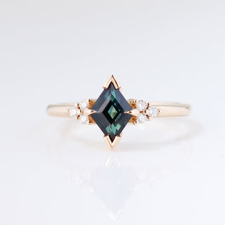 Teal kite sapphire ring in yellow gold front view