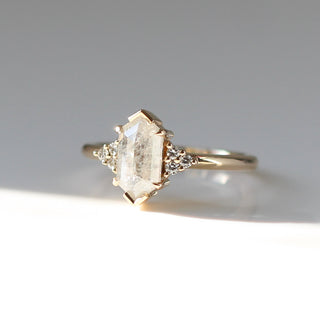 Hexagon diamond engagement ring three quarter view in sunlight