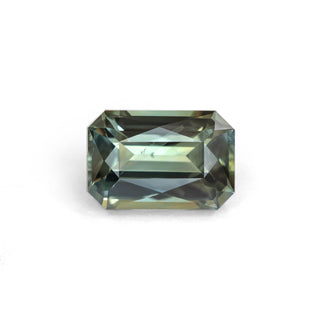 Green radiant cut sapphire on white background
